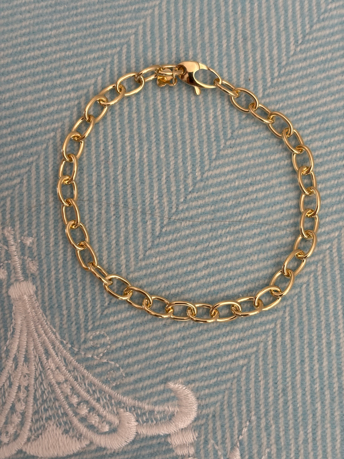Solid Oval Link Charm Bracelet